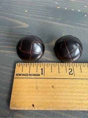 2 x vintage leather buttons